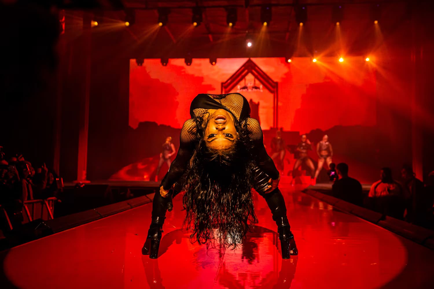 Teyana Taylor performing House of Petunia on a red runway, 2019